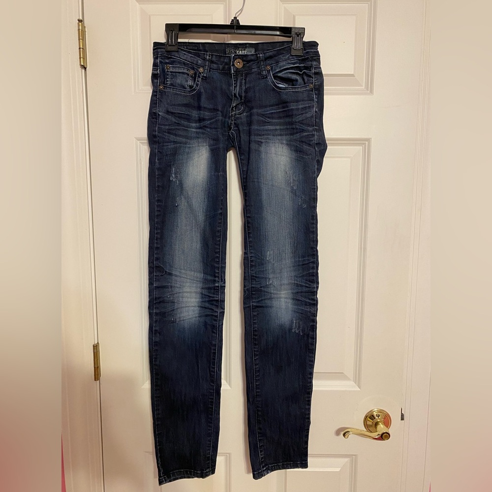 Lightly distressed blue skinny jeans, size 28. Brand: Café Jeans